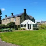 Custom glass roof conservatory installation in the North of England
