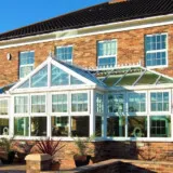 Conservatory interior showing bright, open family space