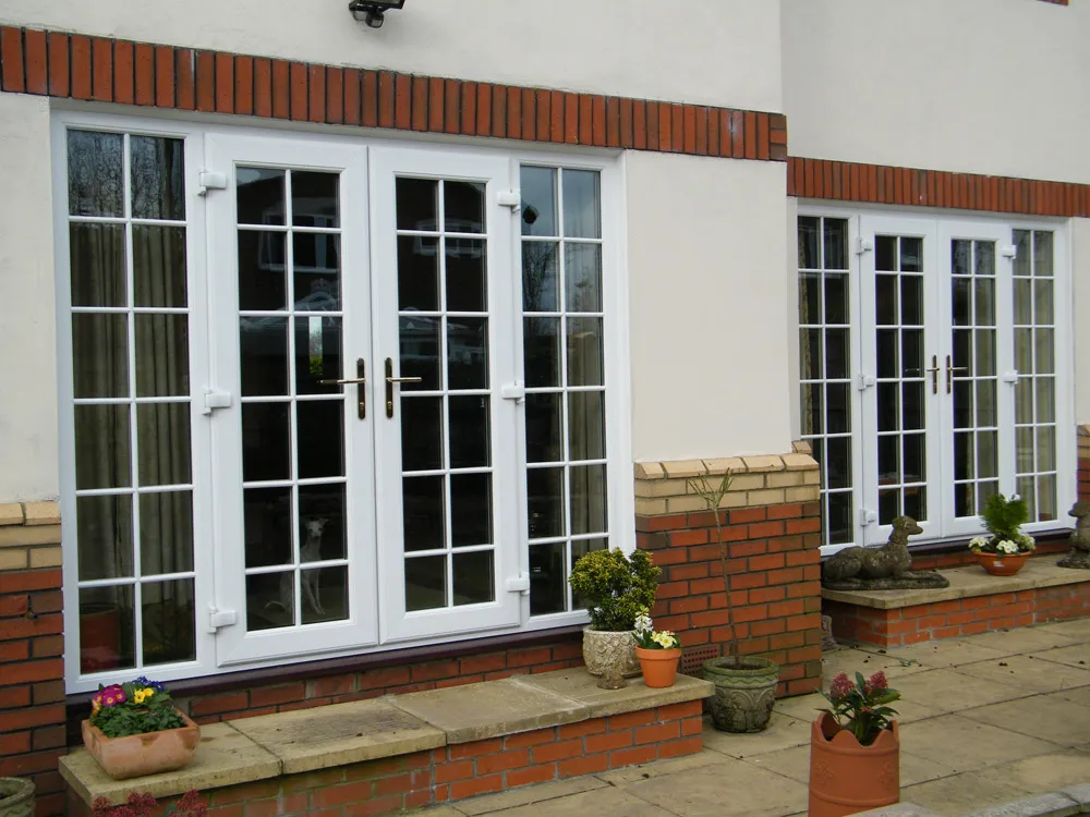 New patio doors fitted to connect conservatory and garden