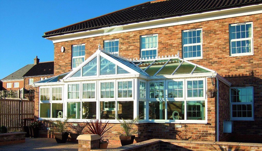 Conservatory interior showing bright, open family space